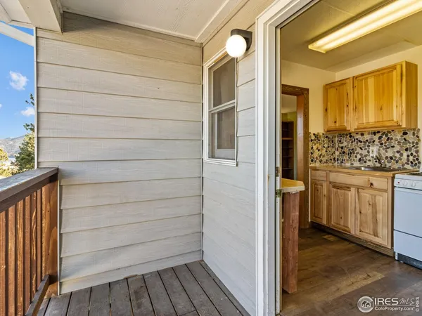 a kitchen with a stove and a refrigerator