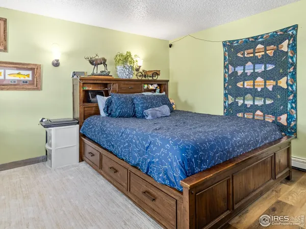 a living room with furniture and a piano