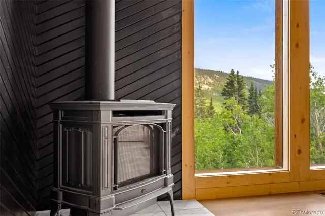 a view of a utility room with a fireplace