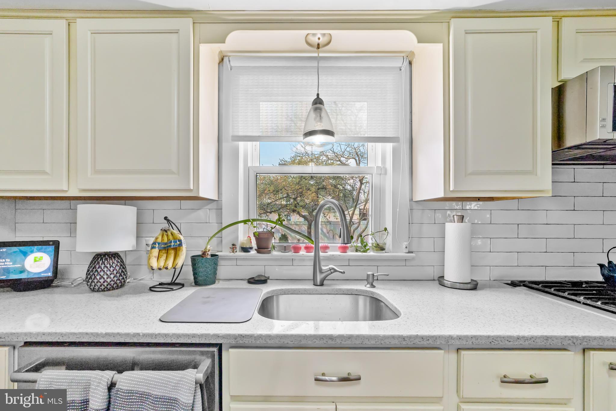 22 James Place Hamilton, NJ 08690 - Photo 11 of 23 a kitchen with sink and cabinets