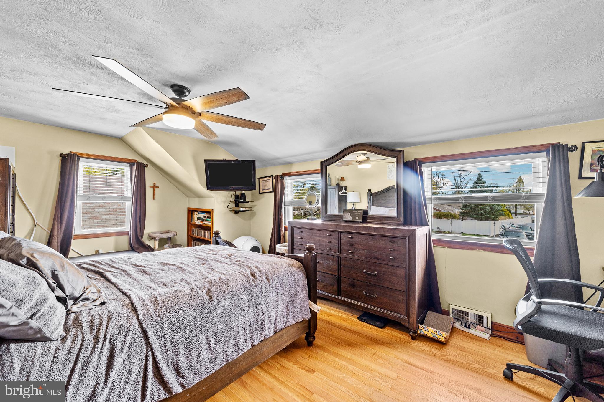 22 James Place Hamilton, NJ 08690 - Photo 14 of 23 a bedroom with a bed and large windows
