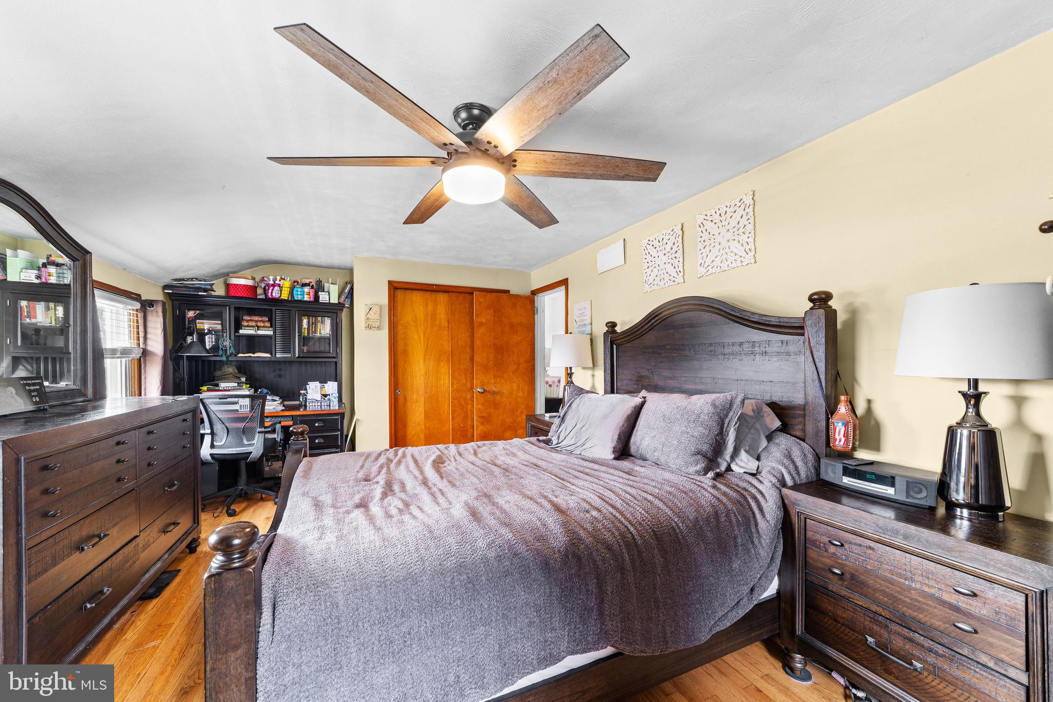 22 James Place Hamilton, NJ 08690 - Photo 15 of 23 a bedroom with a bed and wooden floor