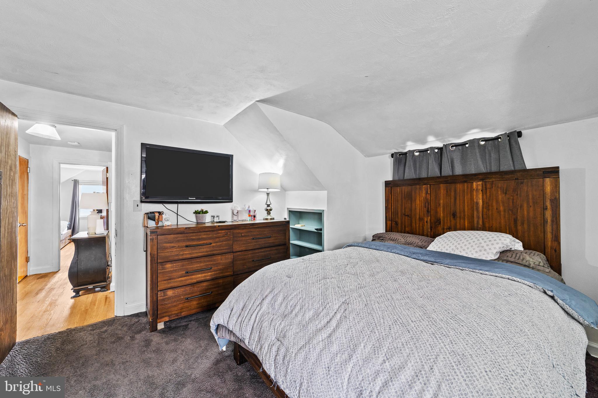 22 James Place Hamilton, NJ 08690 - Photo 16 of 23 a bedroom with a bed and a flat screen tv