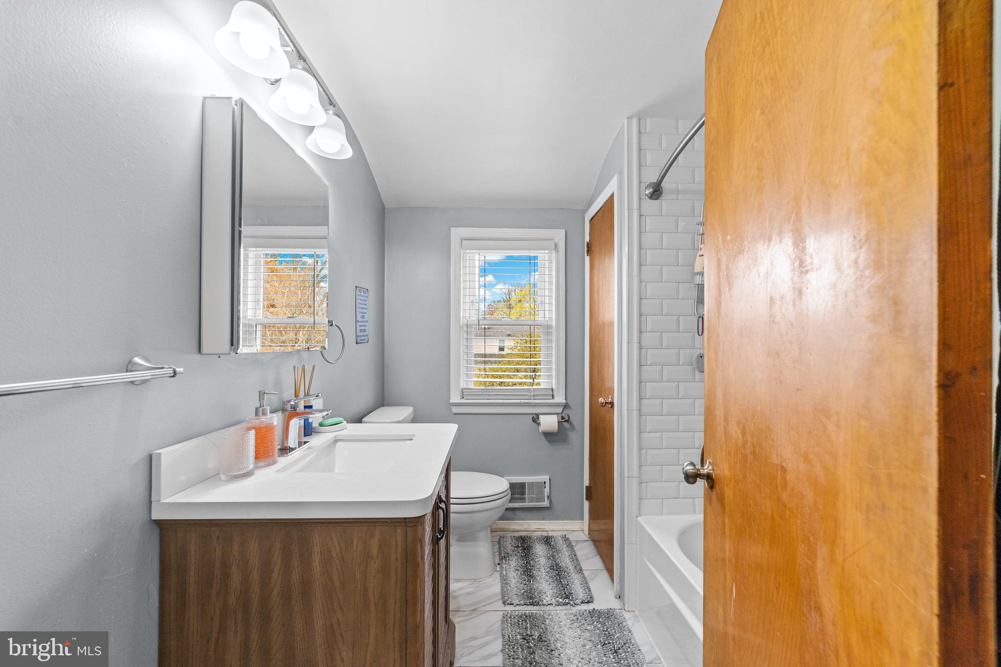 22 James Place Hamilton, NJ 08690 - Photo 18 of 23 a bathroom with a sink and a mirror