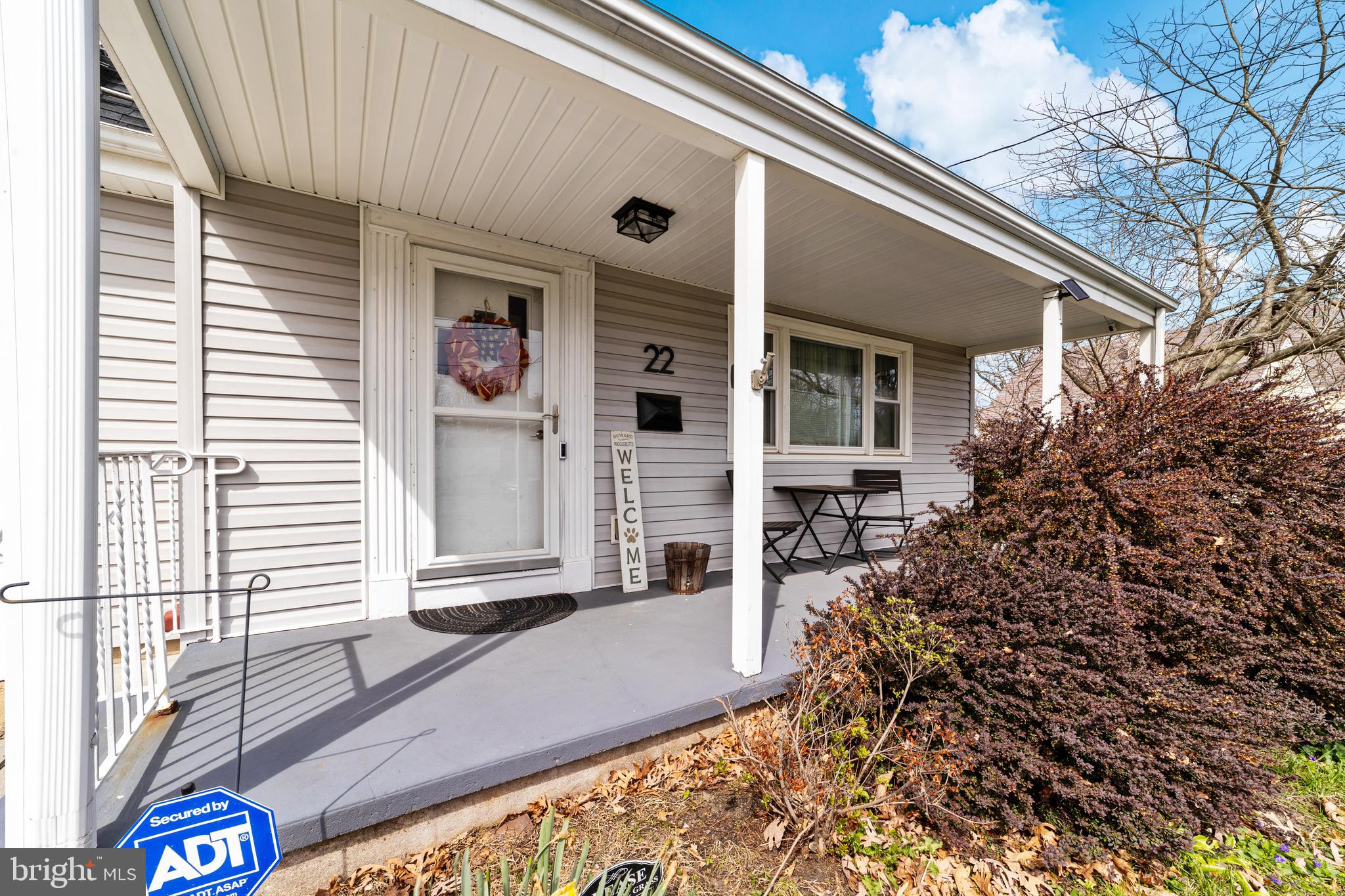 22 James Place Hamilton, NJ 08690 - Photo 4 of 23 a front view of a house with garden