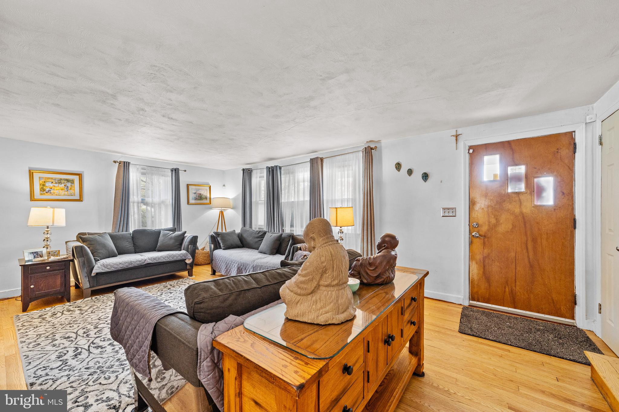 22 James Place Hamilton, NJ 08690 - Photo 6 of 23 a living room with furniture and wooden floor