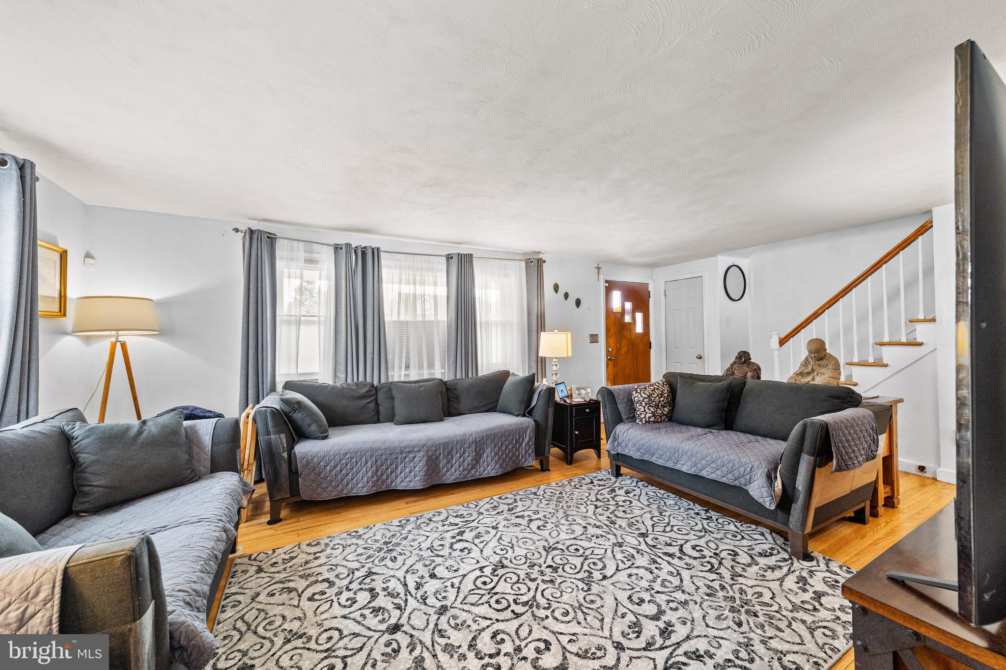 22 James Place Hamilton, NJ 08690 - Photo 7 of 23 a living room with furniture and a couch