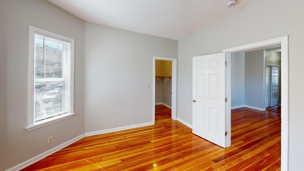 52 Sumner Street, Unit 3 Revere, MA 02151 - Photo 3 of 7 a view of a room with wooden floor and bathroom