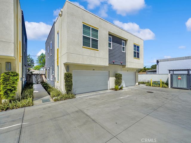 a view of a house with sitting area and garage