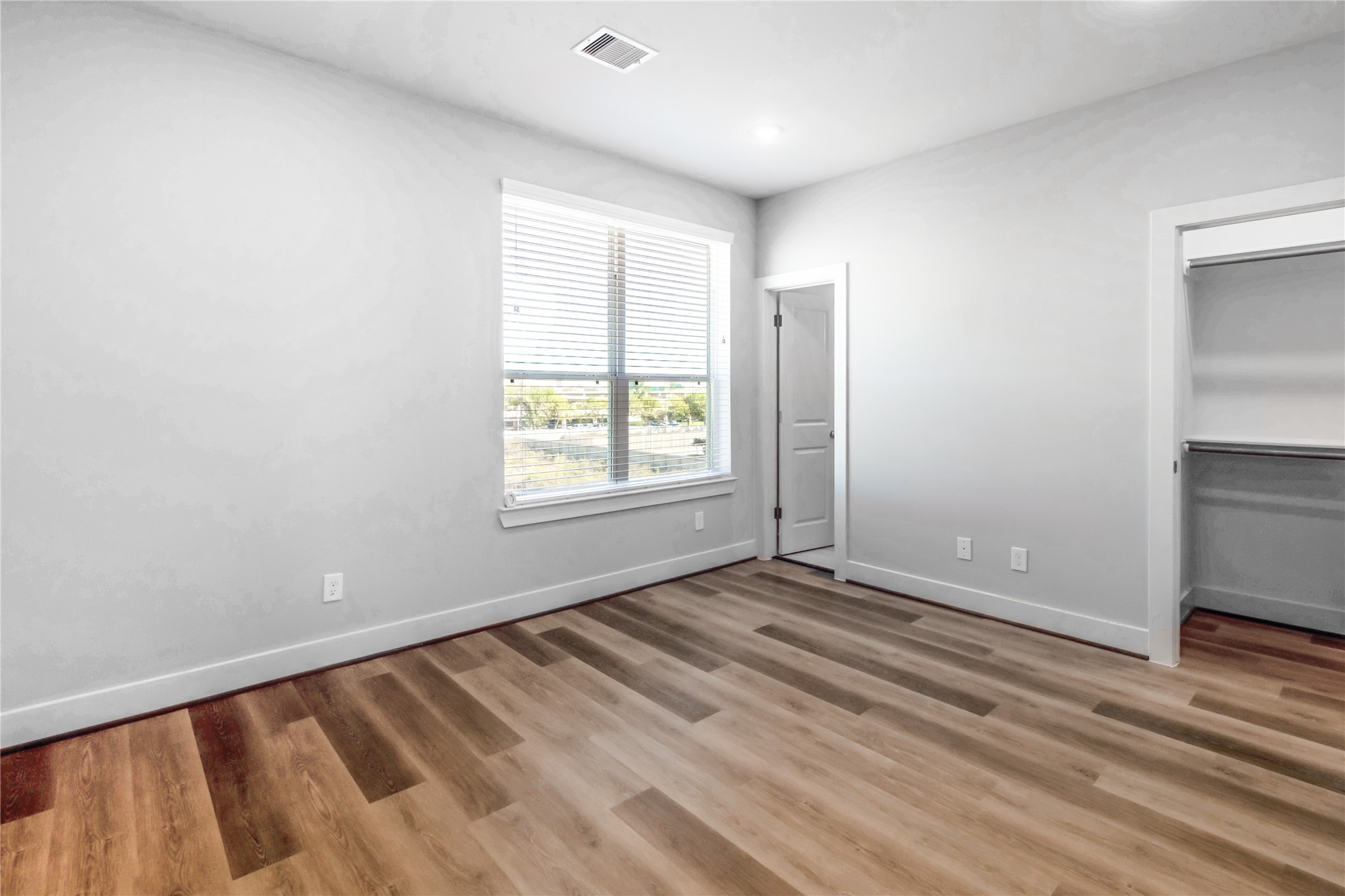 1250 North Post Oak Road, Unit A Houston, TX 77055 - Photo 23 of 31 Bright and spacious third bedroom with a large window and ample closet space.