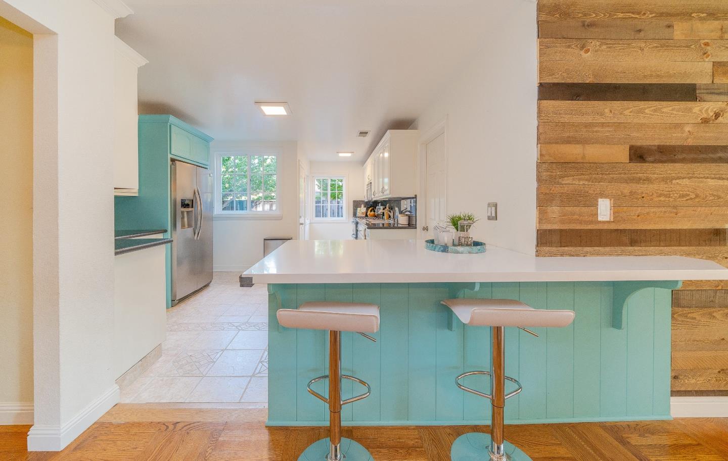 1896 Ellen Avenue San Jose, CA 95125 - Photo 14 of 50 a kitchen with table chairs sink and cabinets