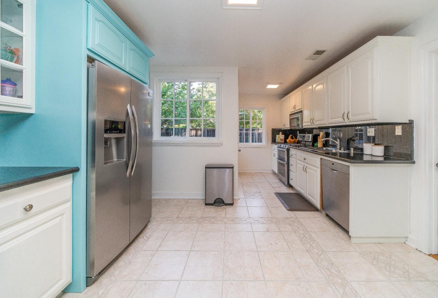 1896 Ellen Avenue San Jose, CA 95125 - Photo 15 of 50 a kitchen with stainless steel appliances granite countertop a refrigerator a sink a stove and oven