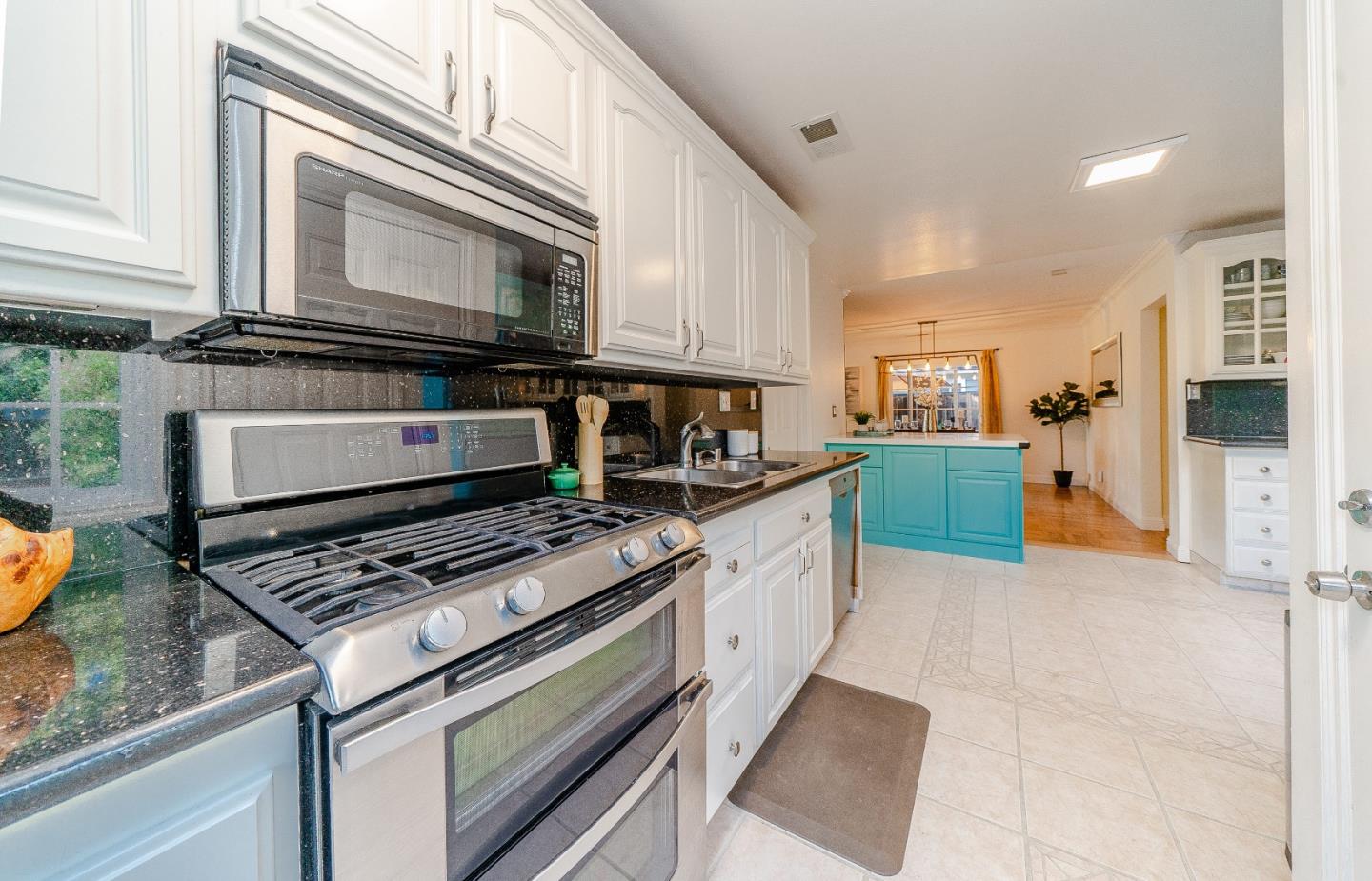 1896 Ellen Avenue San Jose, CA 95125 - Photo 18 of 50 a kitchen with stainless steel appliances granite countertop a stove and a microwave