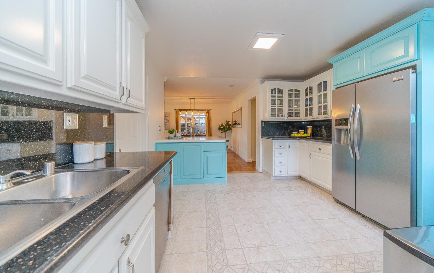 1896 Ellen Avenue San Jose, CA 95125 - Photo 19 of 50 a kitchen with stainless steel appliances granite countertop a sink refrigerator and cabinets