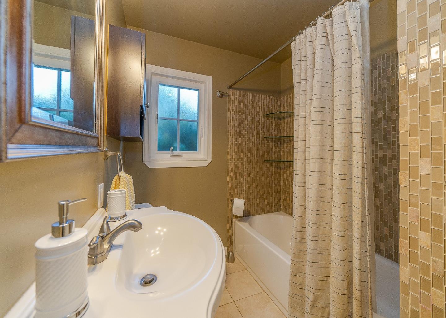 1896 Ellen Avenue San Jose, CA 95125 - Photo 24 of 50 a bathroom with a sink a toilet and shower