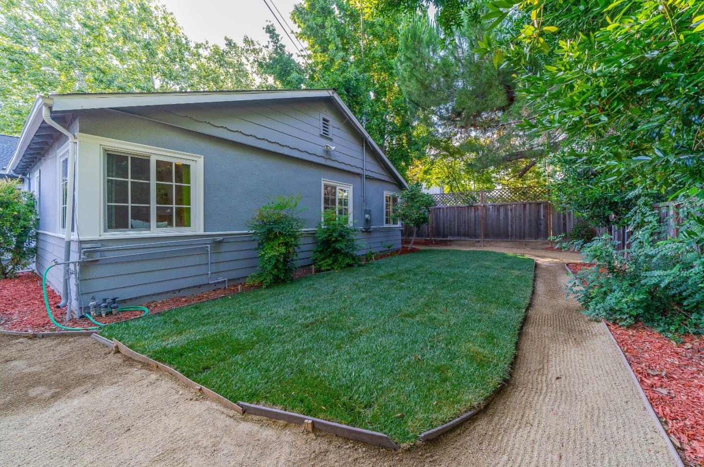1896 Ellen Avenue San Jose, CA 95125 - Photo 28 of 50 a view of backyard with potted plants and a large tree