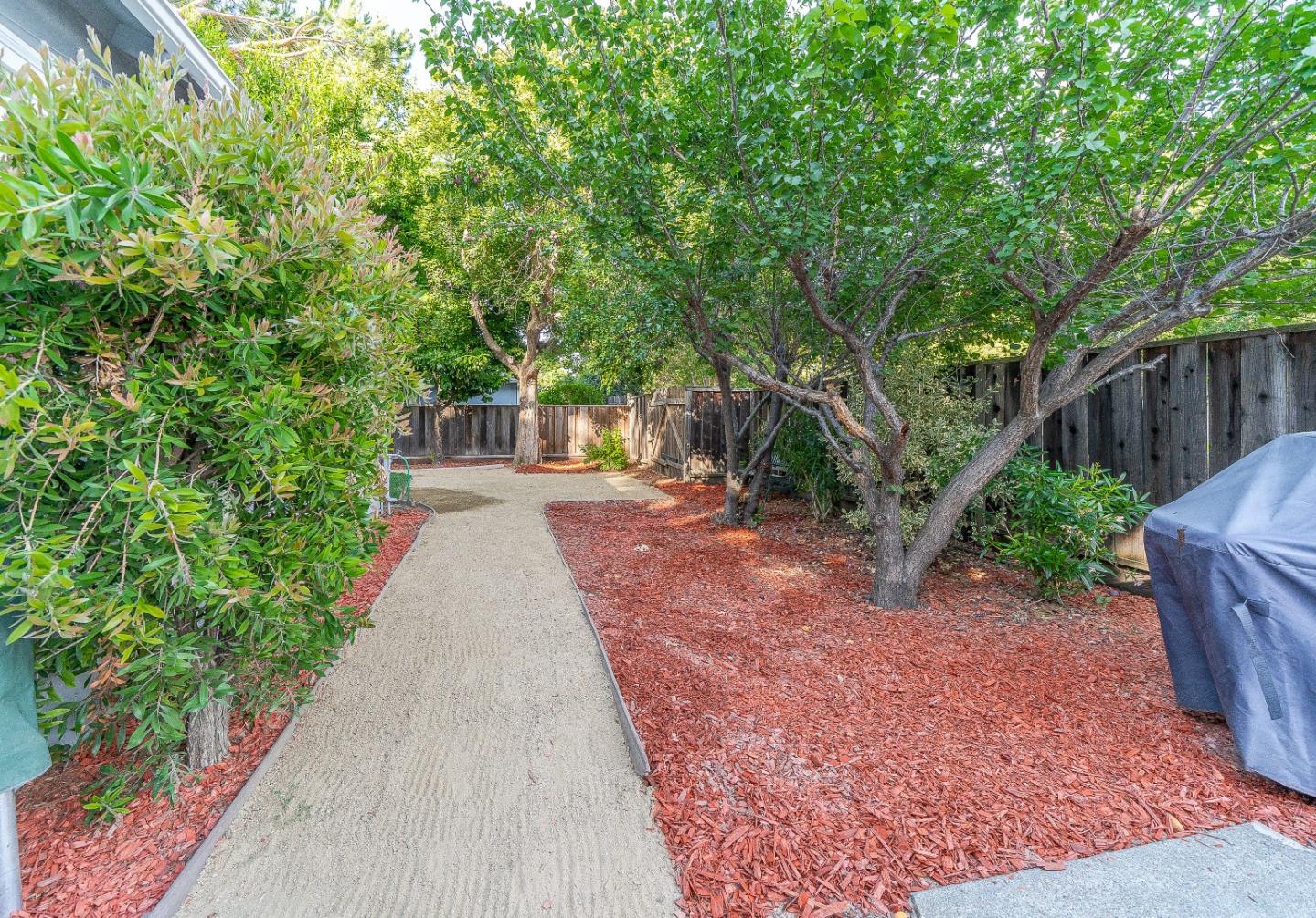 1896 Ellen Avenue San Jose, CA 95125 - Photo 29 of 50 a view of a backyard with potted plants and large trees