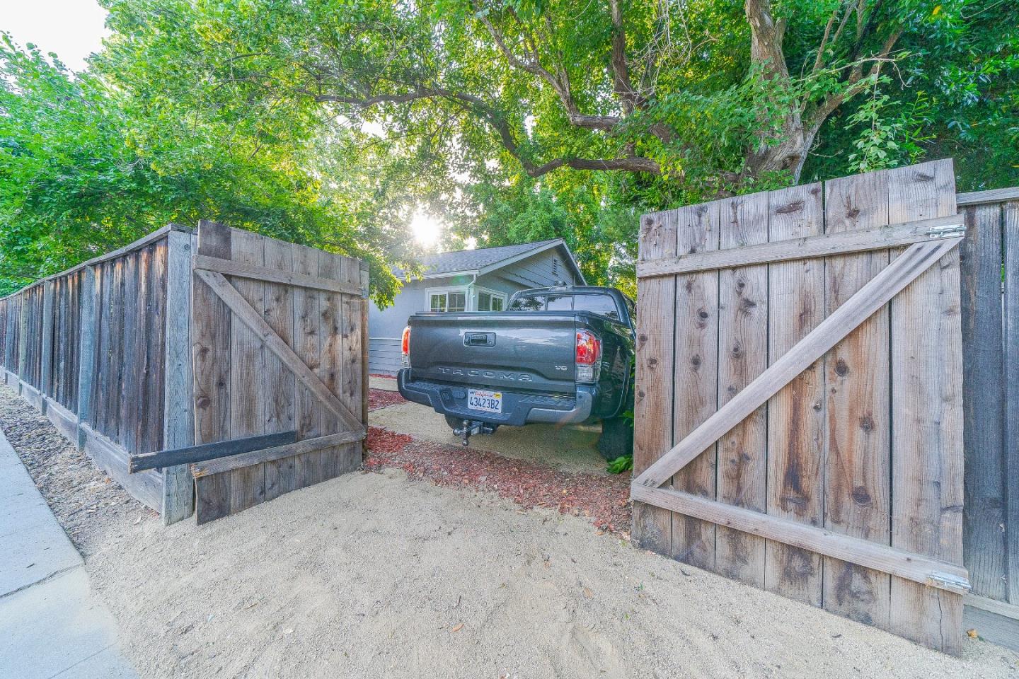 1896 Ellen Avenue San Jose, CA 95125 - Photo 36 of 50 a view of backyard with small cabin and wooden fencing
