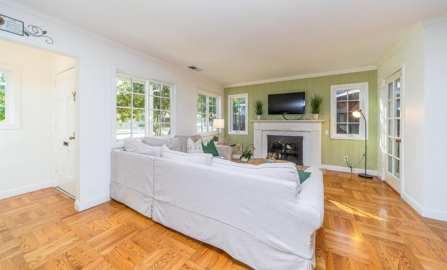 1896 Ellen Avenue San Jose, CA 95125 - Photo 9 of 50 a living room with a flat screen tv and a fireplace