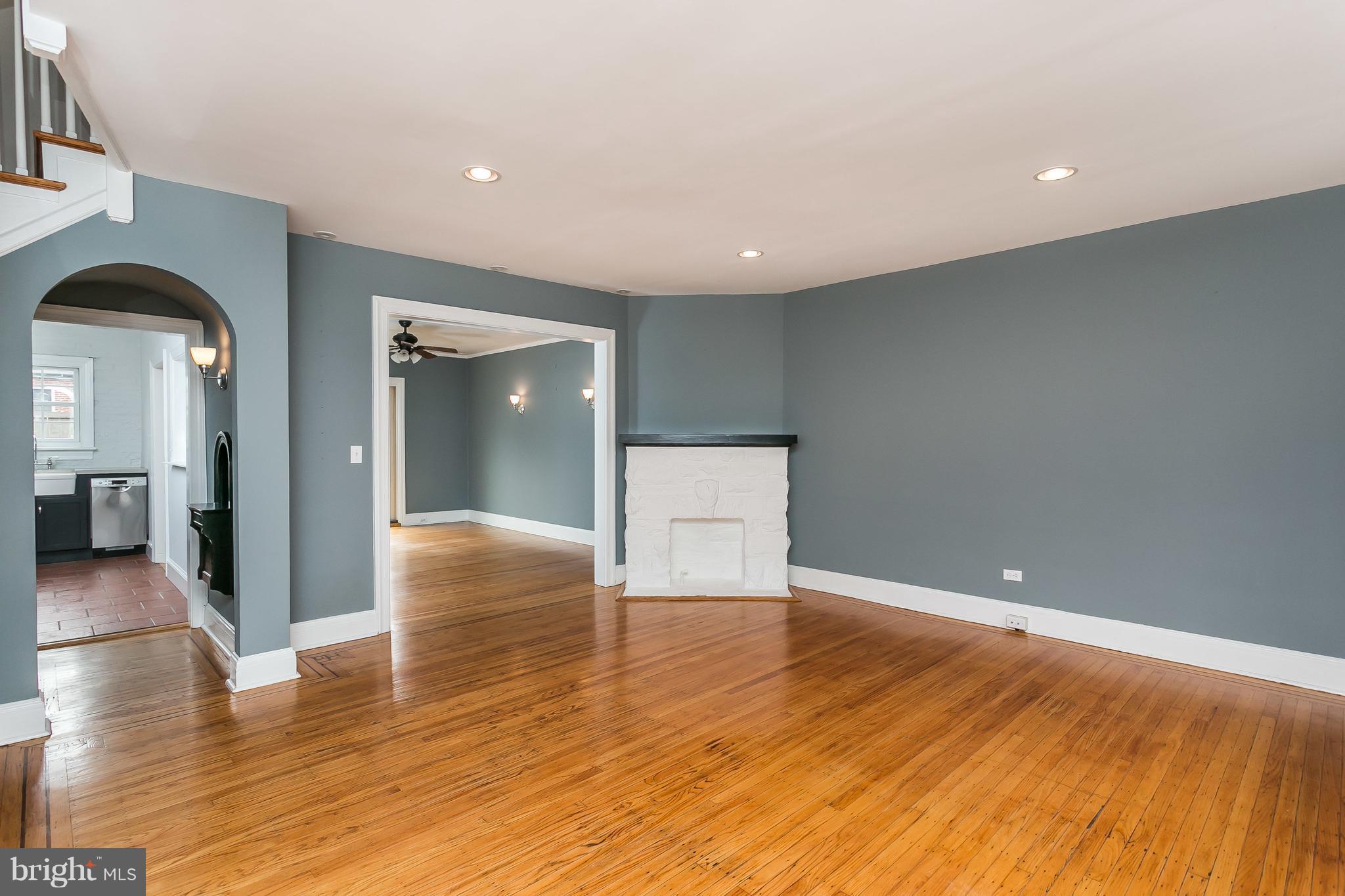 3723 Rexmere Road Baltimore, MD 21218 - Photo 8 of 30 White washed FP ties in with exposed brick in KIT