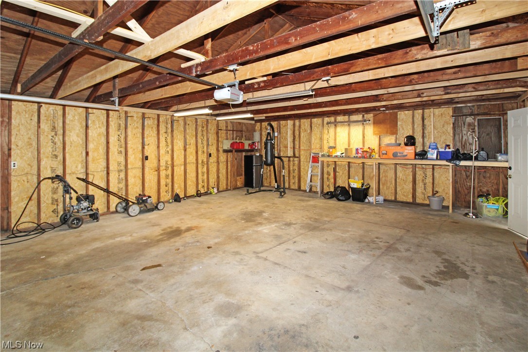 2148 Napoleon Road Fremont, OH 43420 - Photo 6 of 32 Garage with a garage door opener