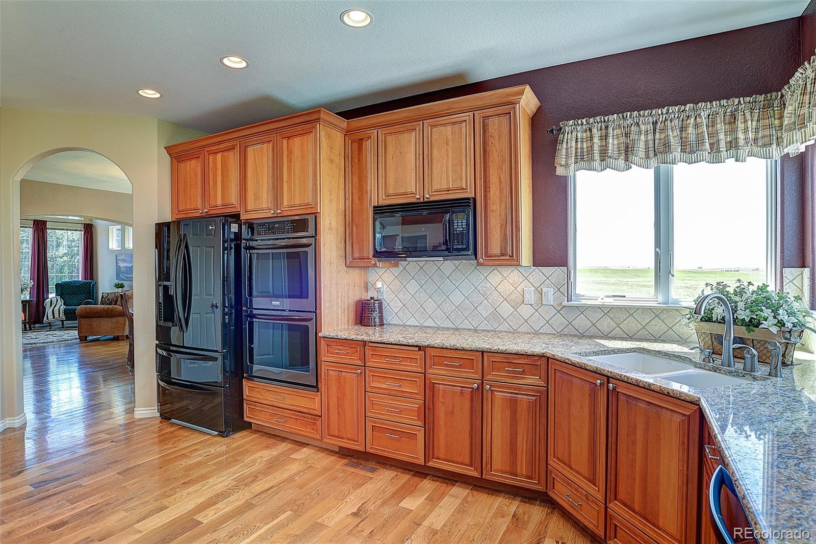 5767 South Tom Bay Road Bennett, CO 80102 - Photo 9 of 40 Gallery Image 9