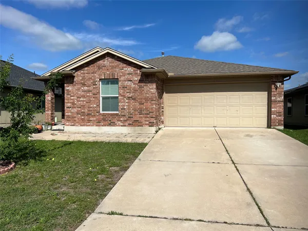 a front view of house with yard