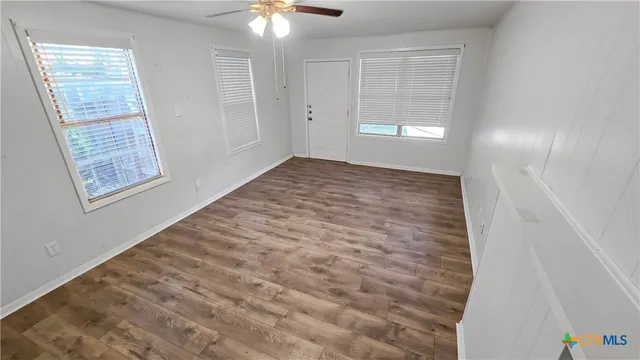 an empty room with windows