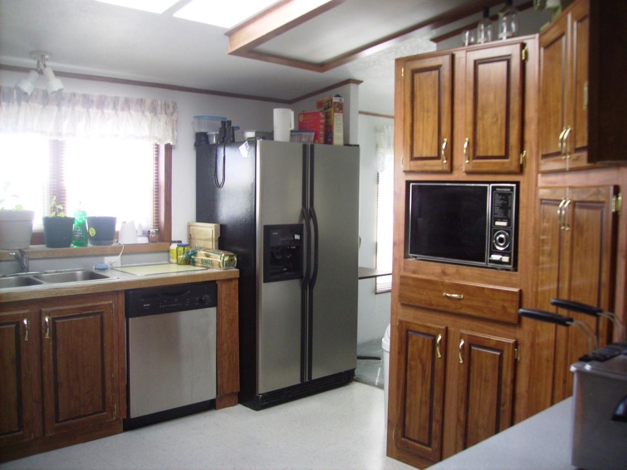 80 Rougk Lane Sunnyside, WA 98944 - Photo 5 of 9 a kitchen with stainless steel appliances granite countertop a refrigerator and a sink