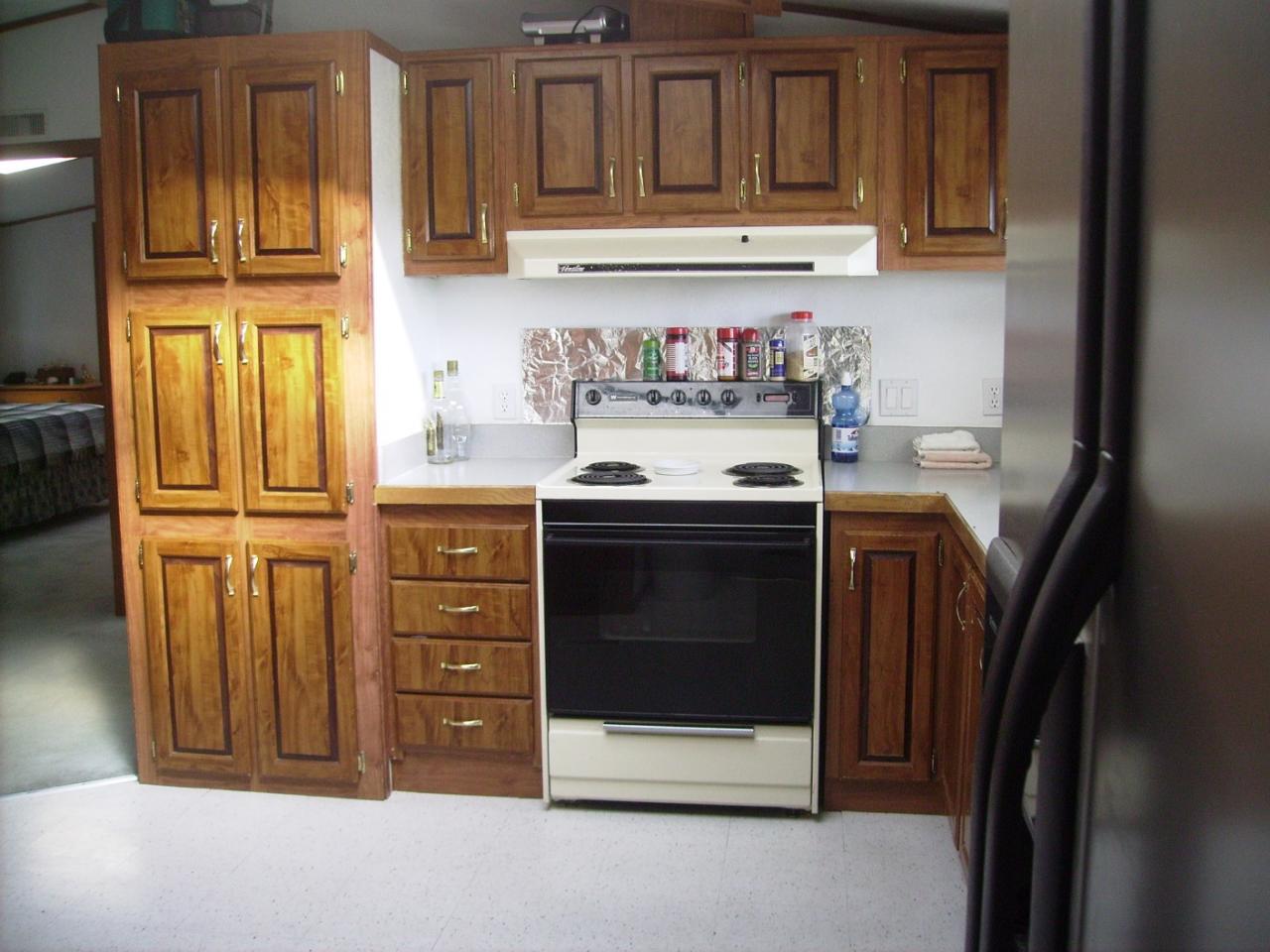 80 Rougk Lane Sunnyside, WA 98944 - Photo 6 of 9 a kitchen with stainless steel appliances granite countertop a refrigerator and cabinets