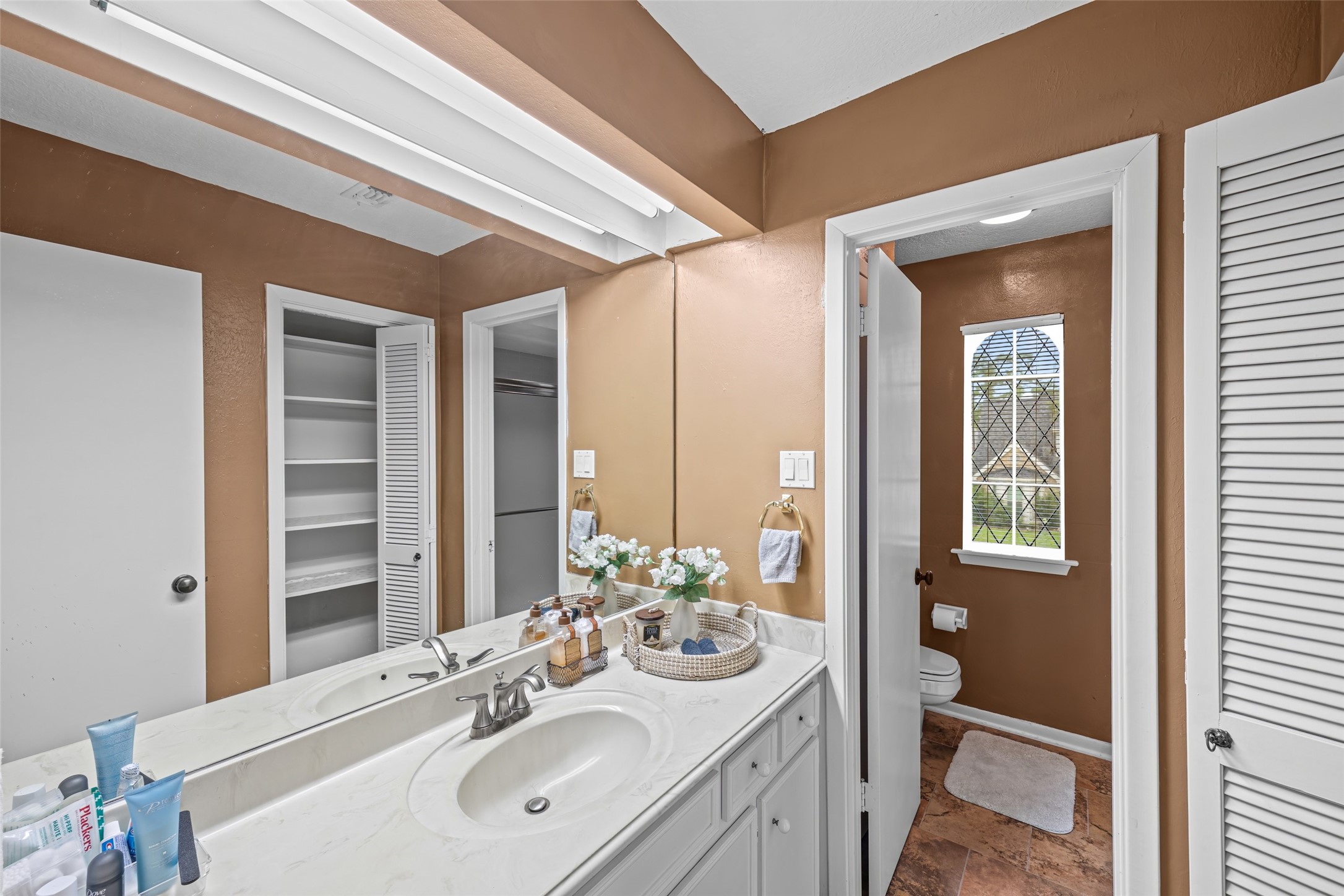 3700 September Drive Baytown, TX 77521 - Photo 20 of 30 a bathroom with a sink and a mirror