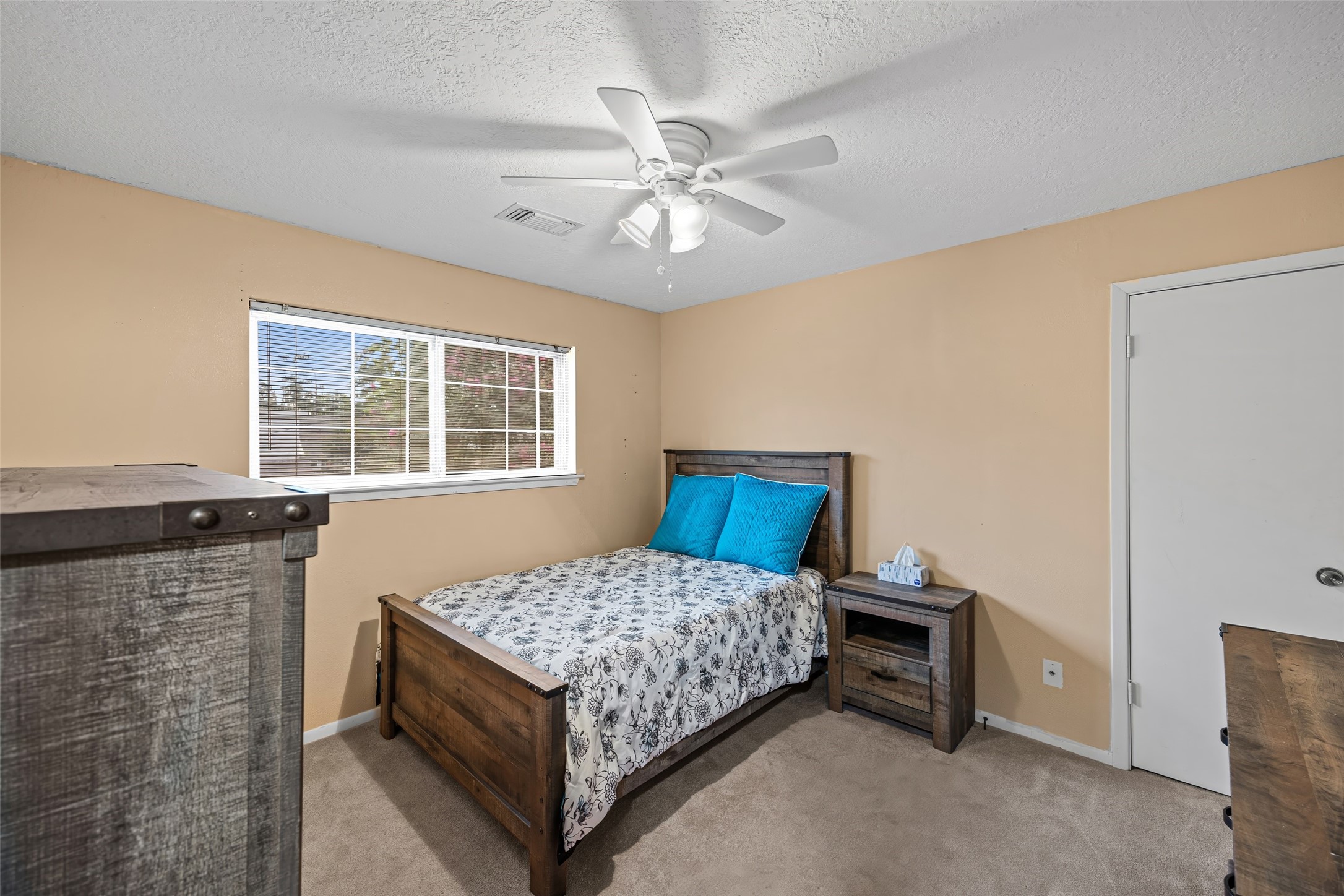 3700 September Drive Baytown, TX 77521 - Photo 25 of 30 a bedroom with a bed and window