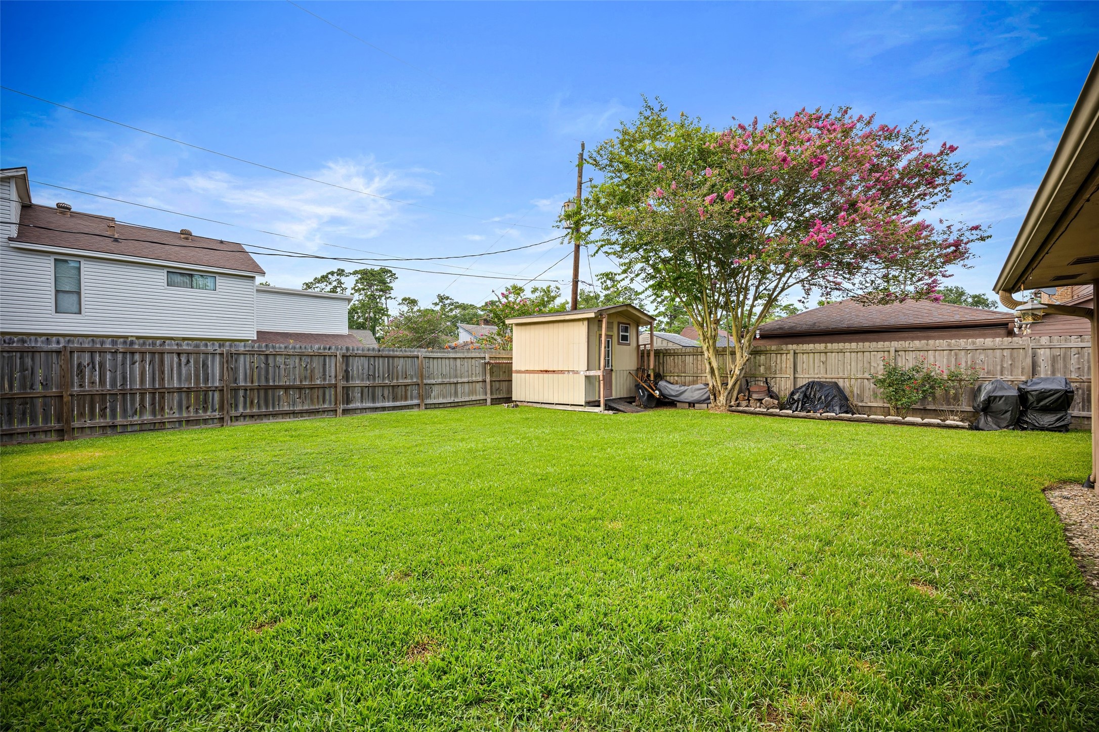 3700 September Drive Baytown, TX 77521 - Photo 29 of 30 a view of a backyard with a garden and entertaining space