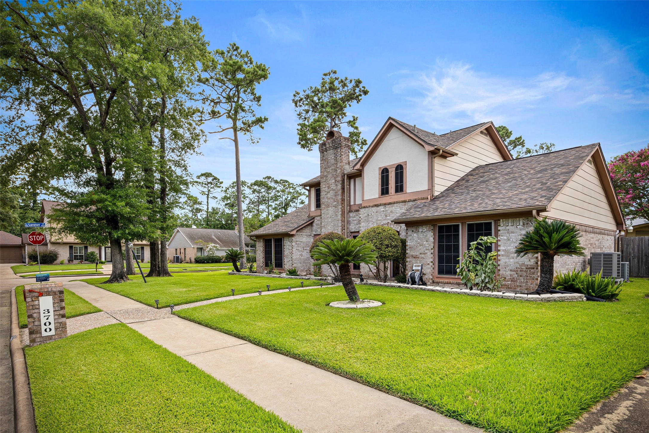 3700 September Drive Baytown, TX 77521 - Photo 3 of 30 a front view of a house with a yard table and chairs