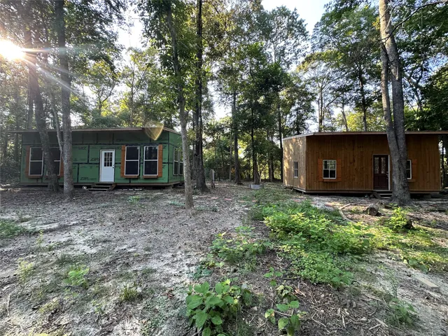 a view of a house with a garden