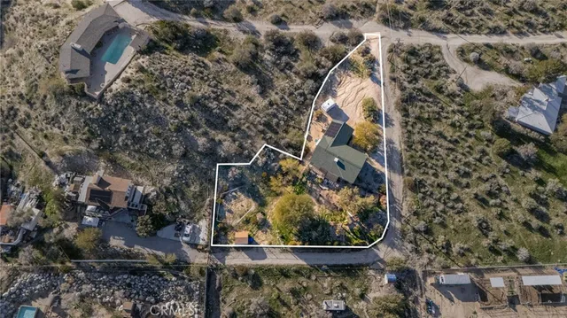 an aerial view of house with outdoor space