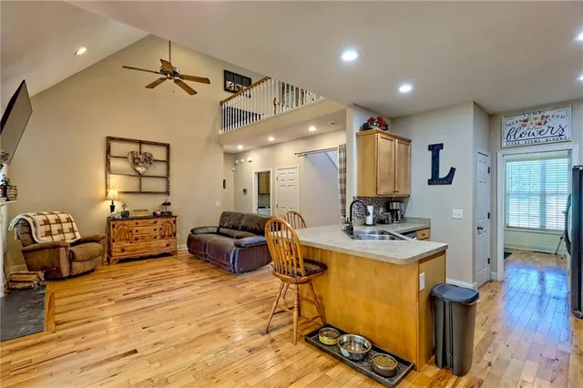a living room with lots of furniture and a fireplace