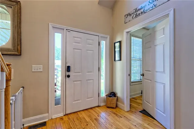 a bathroom with a double vanity sink and mirror