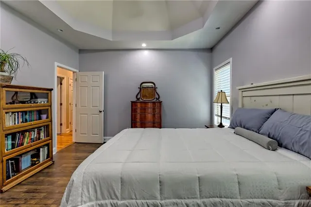 a bathroom with a double vanity sink mirror and shower