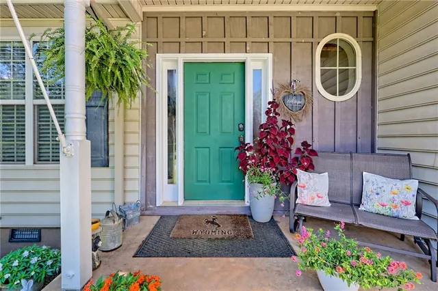 a front view of a house with garden