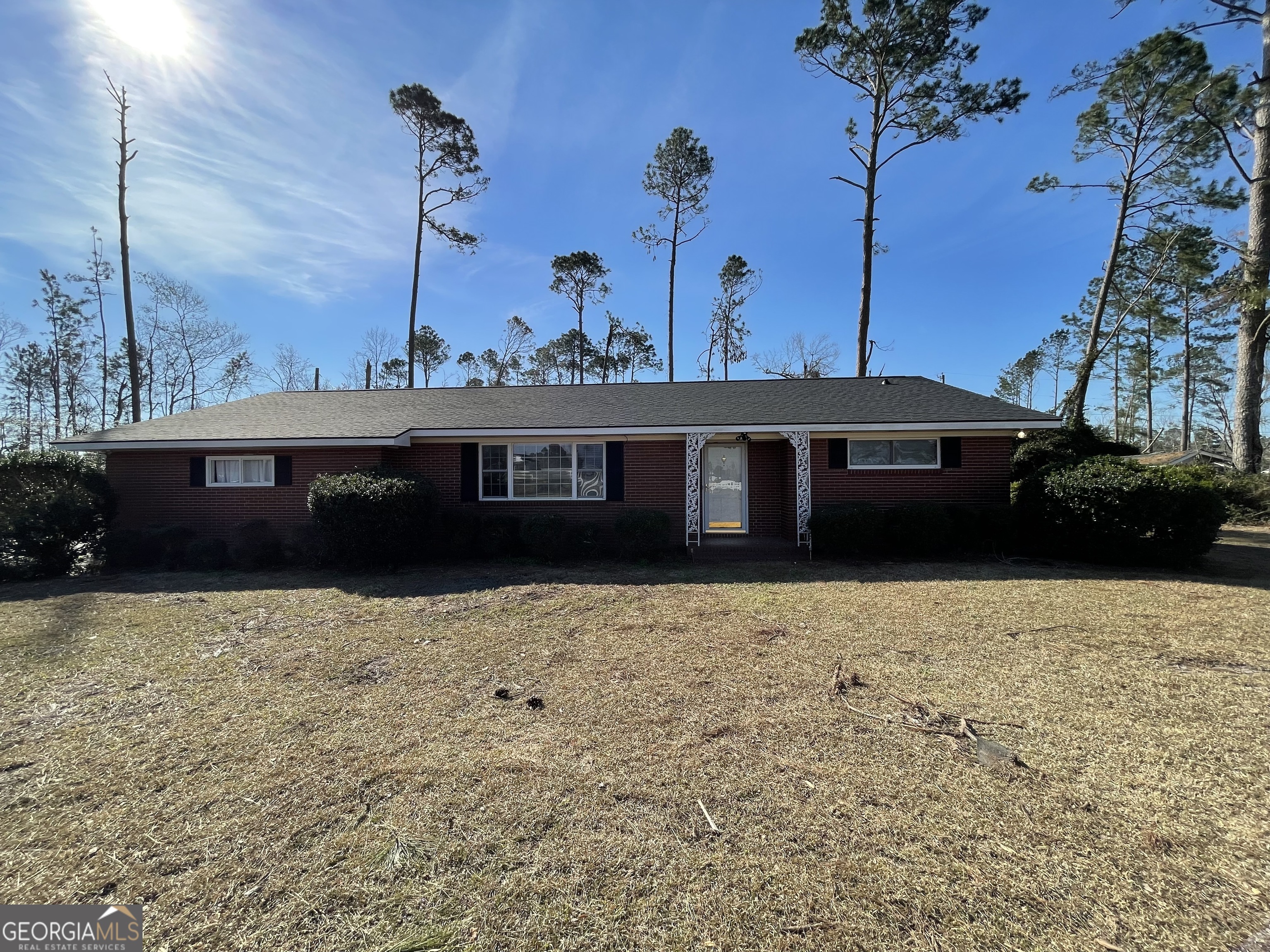 237 Burketts Ferry Road Hazlehurst, GA 31539 - Photo 1 of 1 a front view of a house with a yard