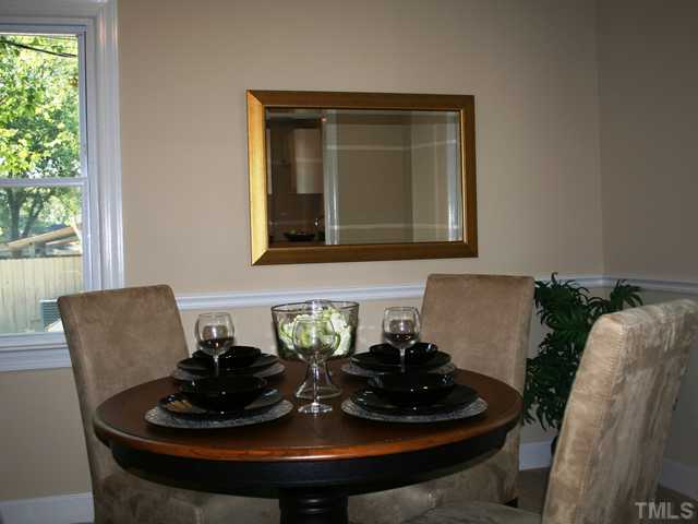 735 Colonial Drive Raleigh, NC 27603 - Photo 3 of 6 fresh new paint, new carpet, new moldings!