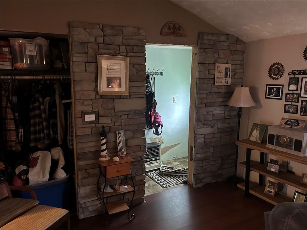 203 2nd Street Brownfield, PA 15416 - Photo 7 of 27 a room with furniture and a fireplace