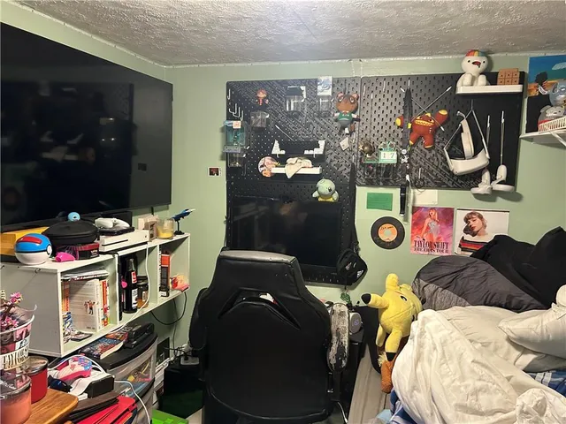 a living room filled with furniture and a couch