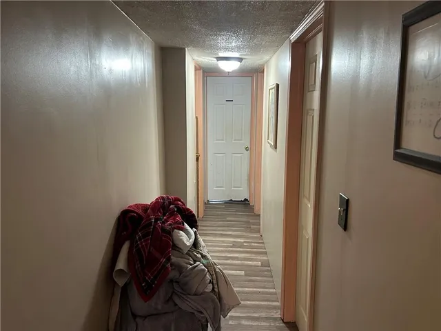 a bathroom with a mirror and a shower