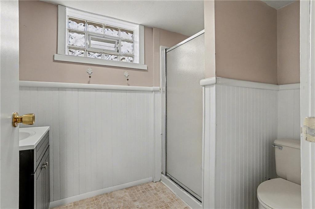 444 Violet Drive Lower Burrell, PA 15068 - Photo 13 of 19 a view of a hallway with paintings on the wall