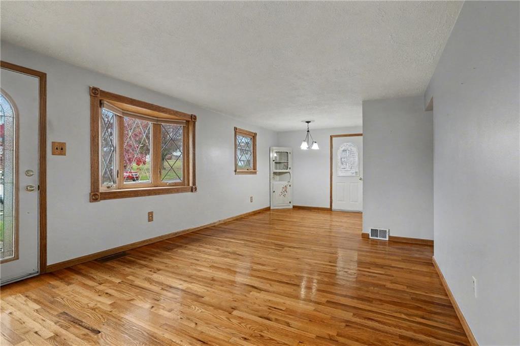 444 Violet Drive Lower Burrell, PA 15068 - Photo 5 of 19 a view of empty room with wooden floor