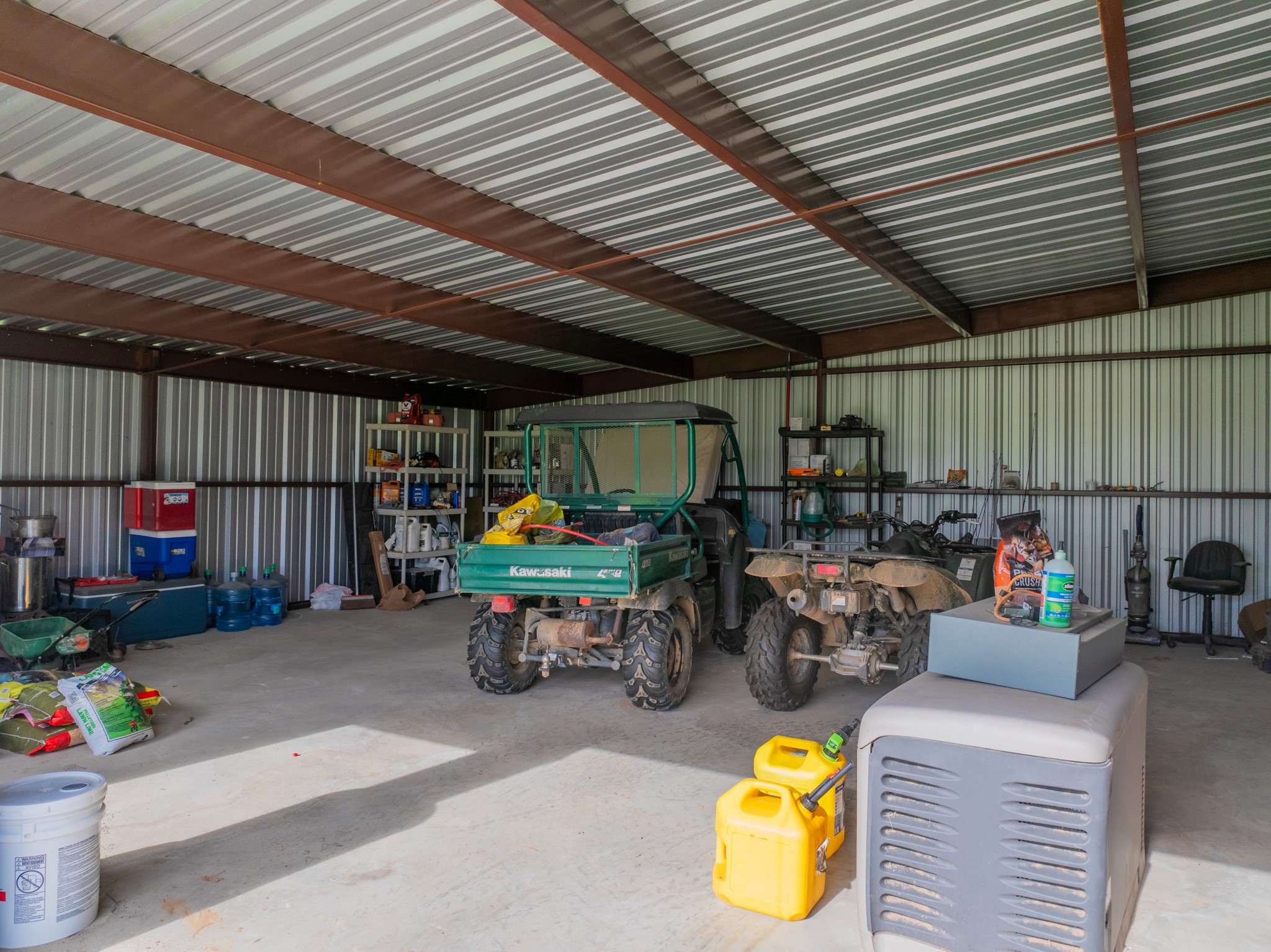 11079 Cr 266 Rochelle Tx 76872 Rochelle, TX 76872 - Photo 23 of 40 Metal-frame outbuilding featuring a corrugated metal roof and walls