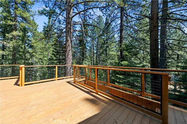 a view of balcony with two trees