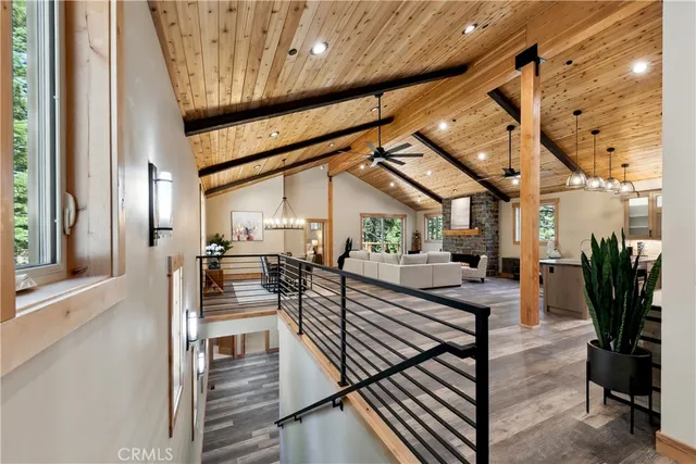 a view of a livingroom with furniture and wooden floor